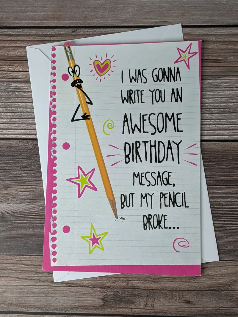 A birthday card with an image of a pencil on the front cover, and a humorous message.